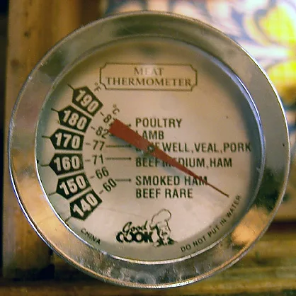 instant read thermometer checking pot pie doneness