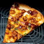how do you warm up pizza in an air fryer